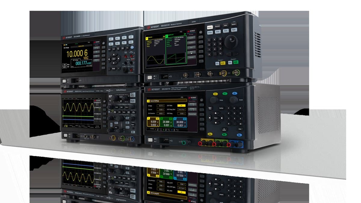 Multiple next-generation smartwatches displayed on a tech testing bench with measurement equipment