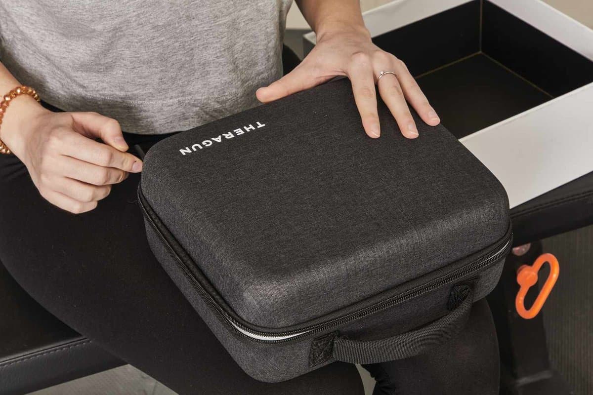 RecoveryMax Elite massage gun with carrying case