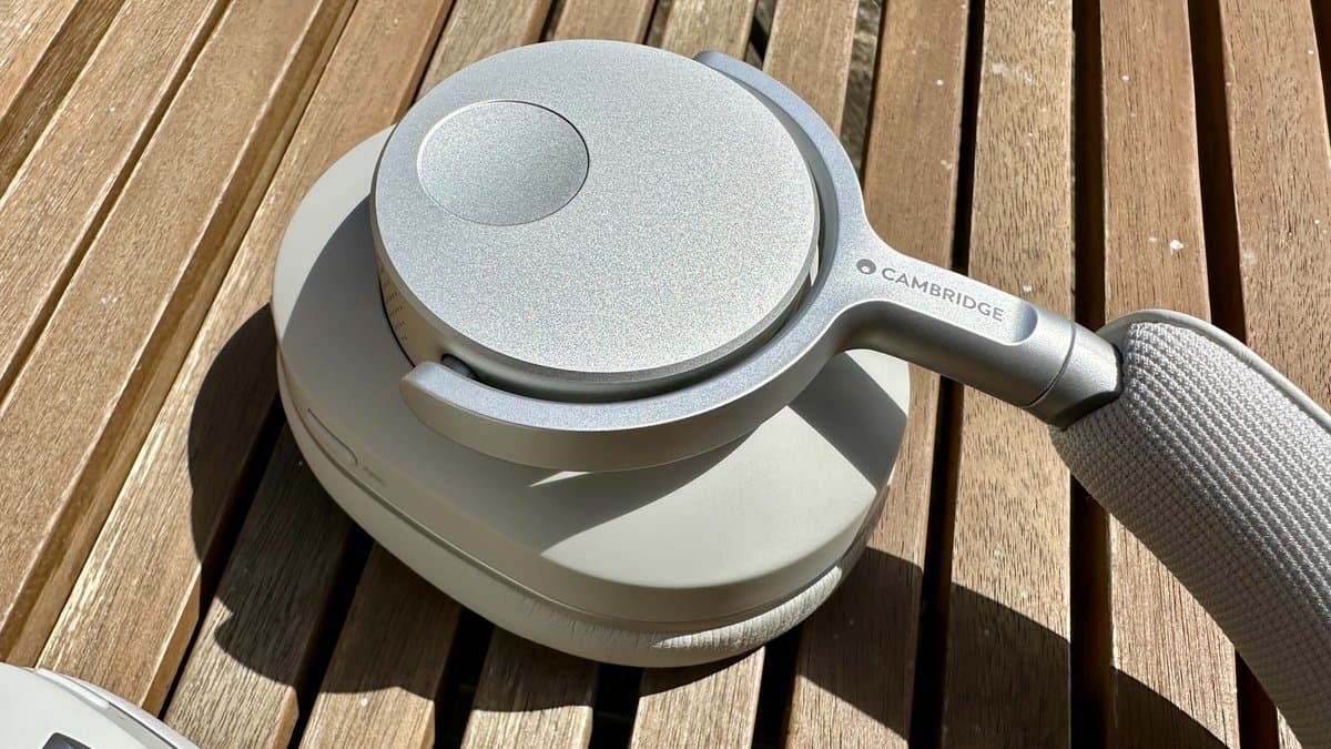The best headphones of 2026 arranged on a wooden desk with measurement equipment