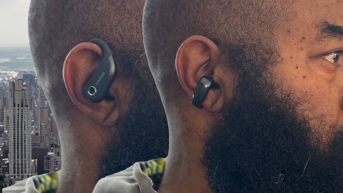 Bose Ultra Open Earbuds clipped to runner's earlobe showing unique attachment design