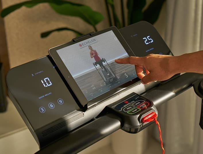 Echelon Fitness Stride-6 treadmill showing its walking-focused design and tablet holder