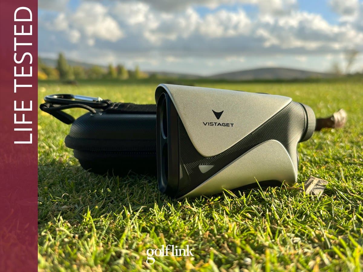 Budget golf rangefinders being tested on a golf course with golfers comparing readings against pin positions