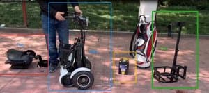 Golf bag with integrated tech features and charging ports