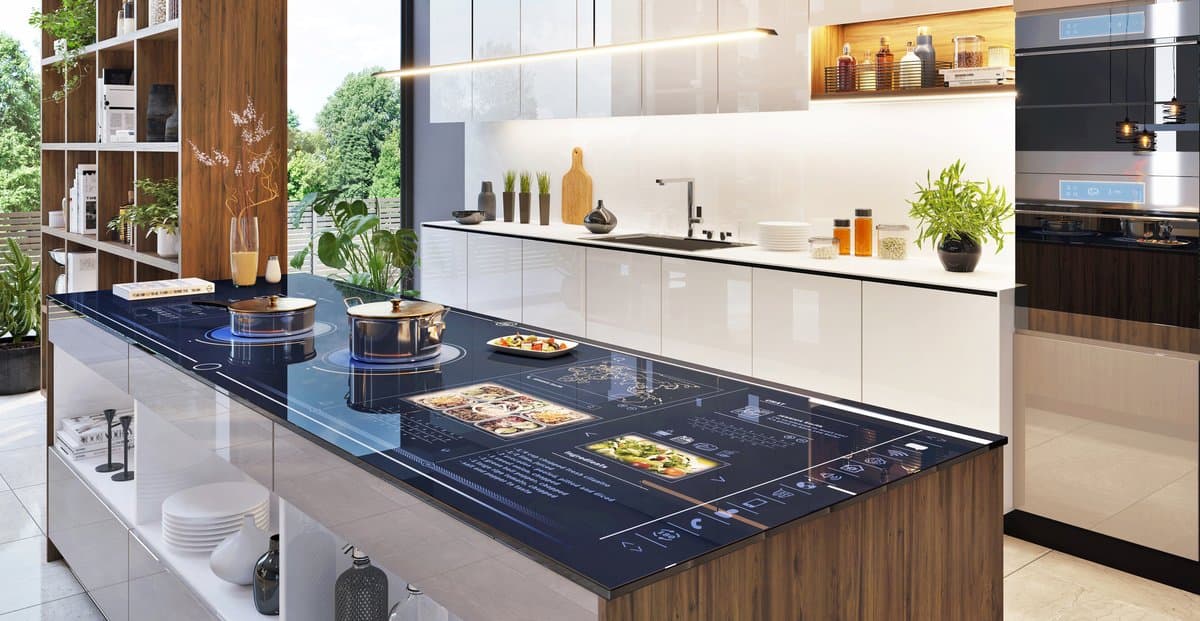 Smart kitchen appliances arranged on modern countertop with smartphone controls