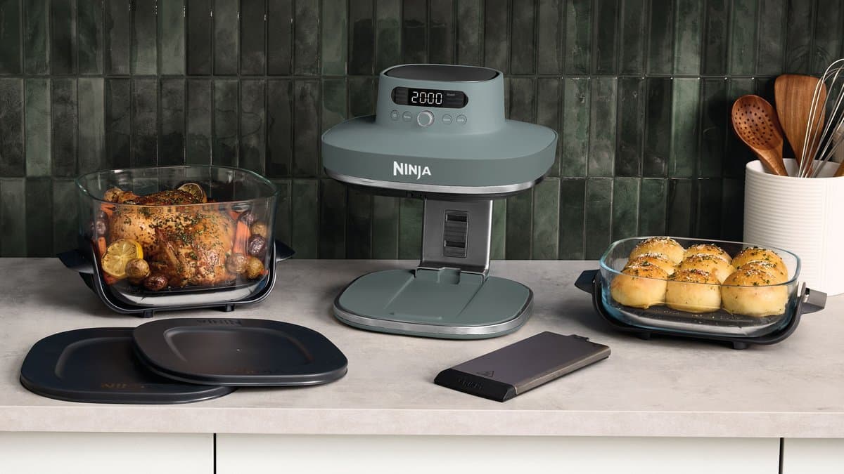 Ninja Air Fryer Pro on kitchen counter with smartphone app interface