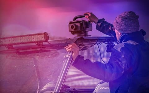 Best thermal night vision dash cams mounted on car dashboard showing thermal and optical feeds