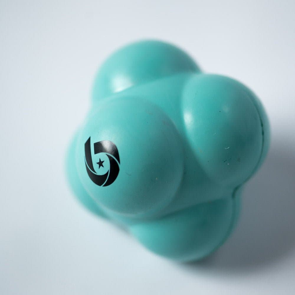 Various textured reaction balls with irregular shapes designed for unpredictable bounces